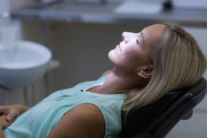 Dental Patient Under Dental Sedation Before Dental Implants