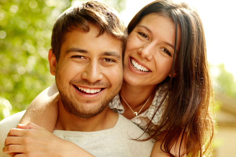 Dental Patients Smiling With Well Cared For Dental Implants In Prairieville, LA
