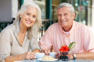 Dental Implant Patients Eating Together With Their False Teeth in Prairieville, LA
